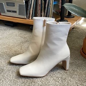 Brand new, white booties. Size 8